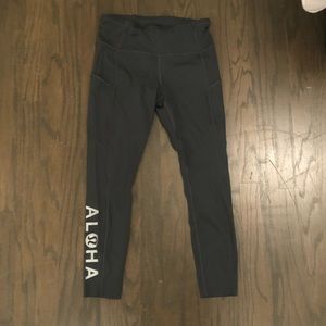 Navy Lululemon leggings with ALOHA logo